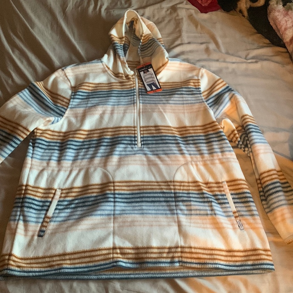 This is a lightweight thin pink blue brown mixture sweater very soft and comfy.